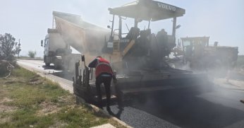 Üniversite Caddesine asfalt ve yaya kaldırımı